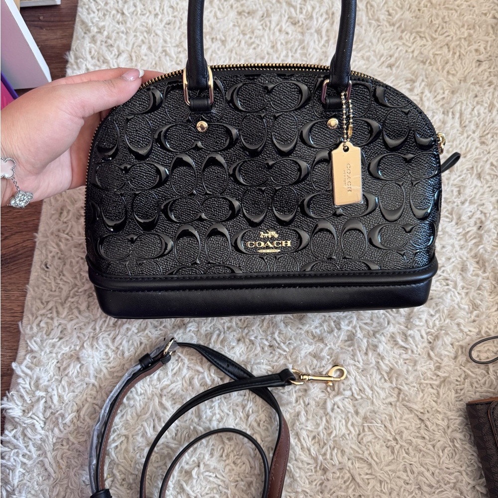 Coach Black Satchel with Embossed Pattern and Gold Hardware